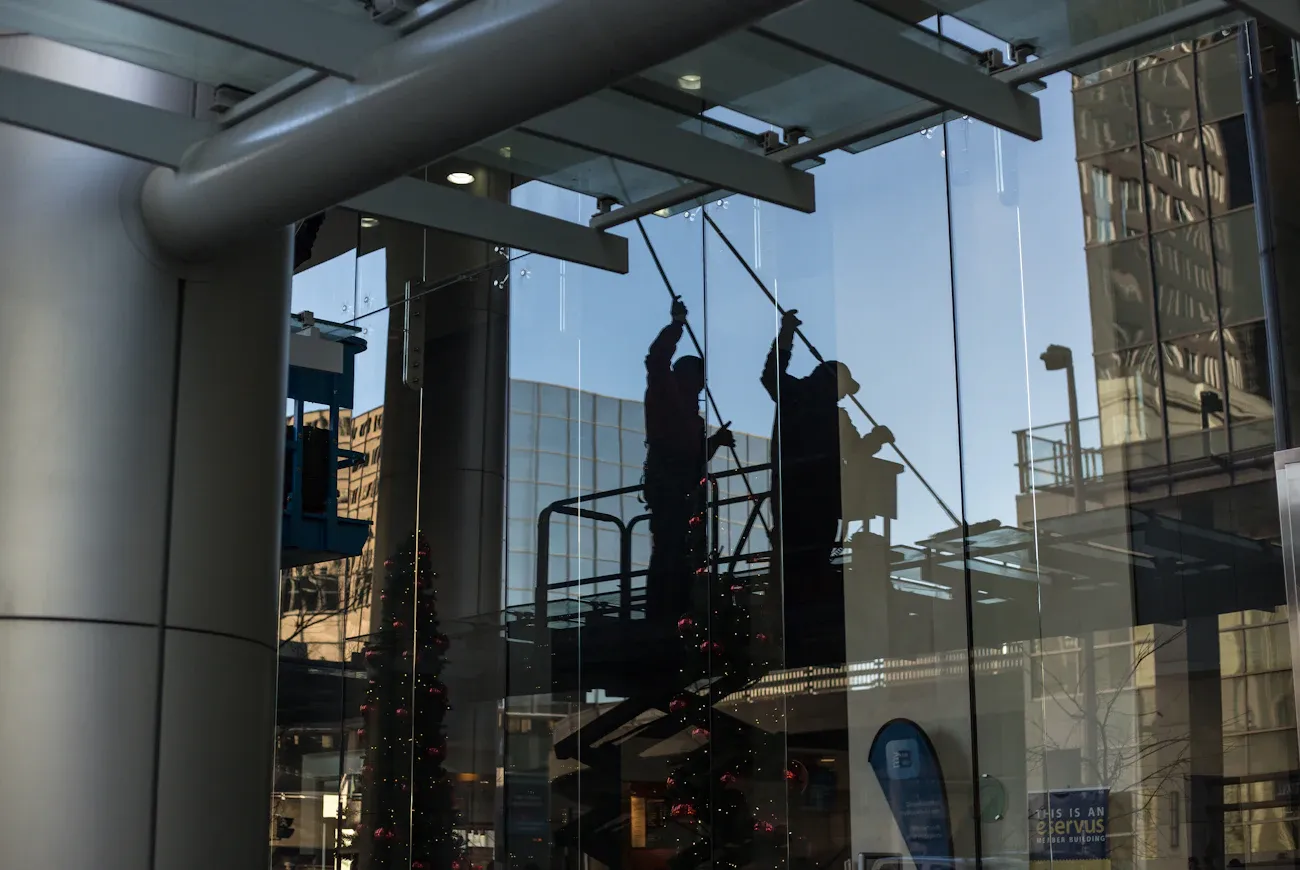 Tidy Windows crew cleaning commercial glass
